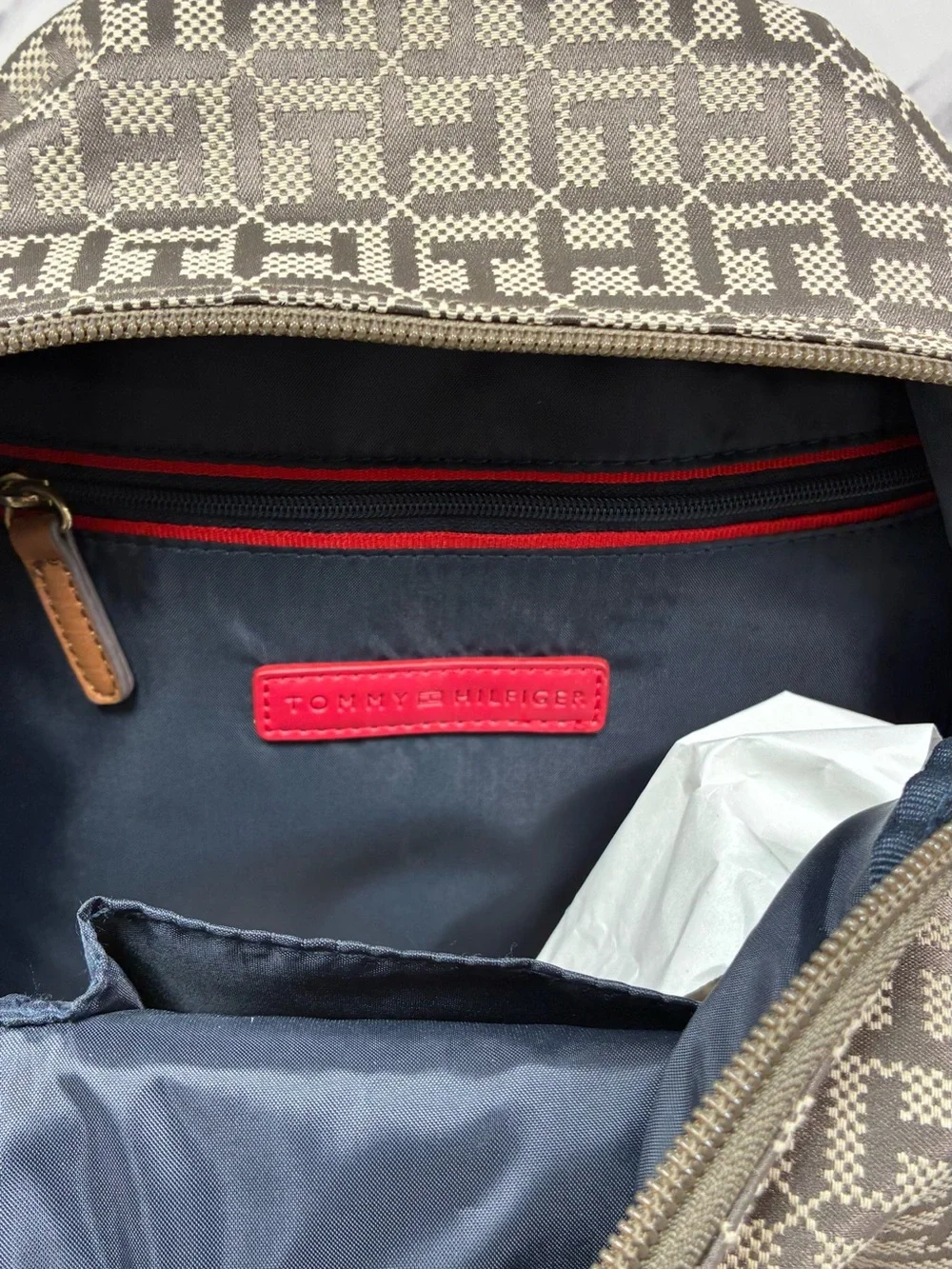 Tommy Hilfiger Beige Monogram Backpack with Red-White-Blue Stripe